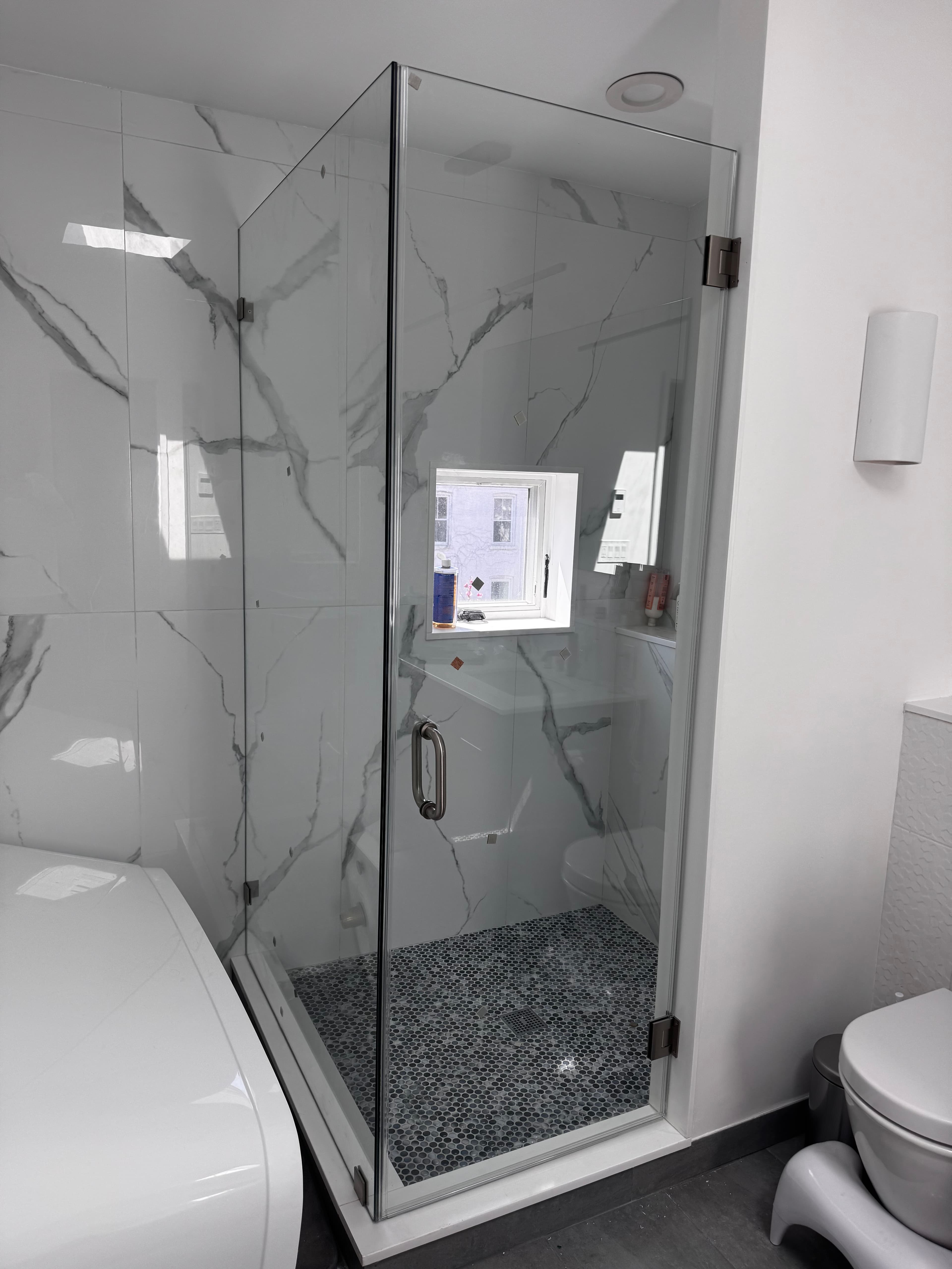 Corner Swing Door shower door installation in Williamsburg Brooklyn