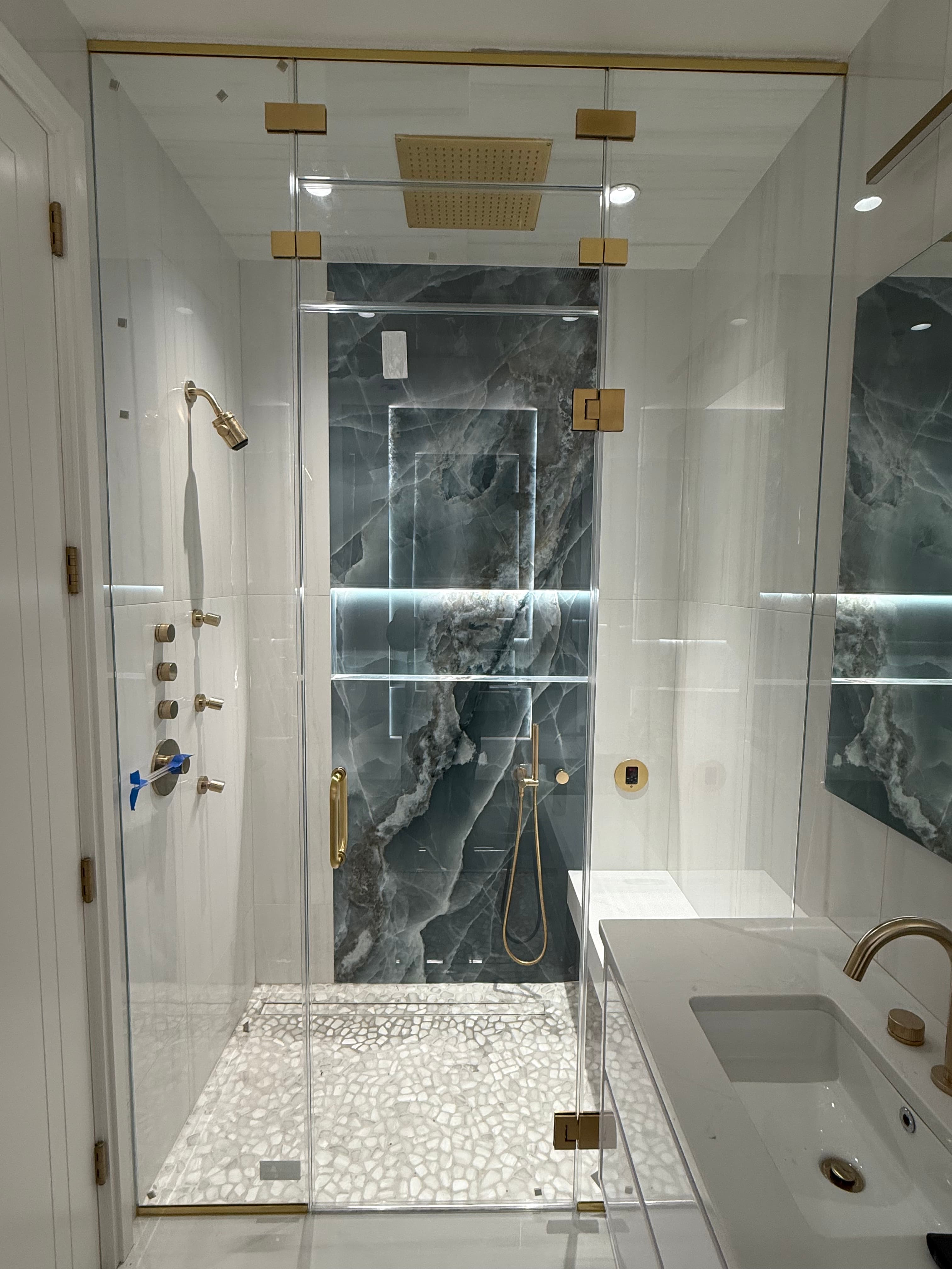 Steam Room - Fully sealed enclosure for steam shower functionality.